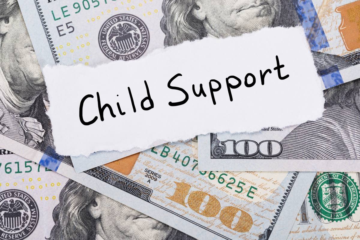 The words child support over 100 dollars bills